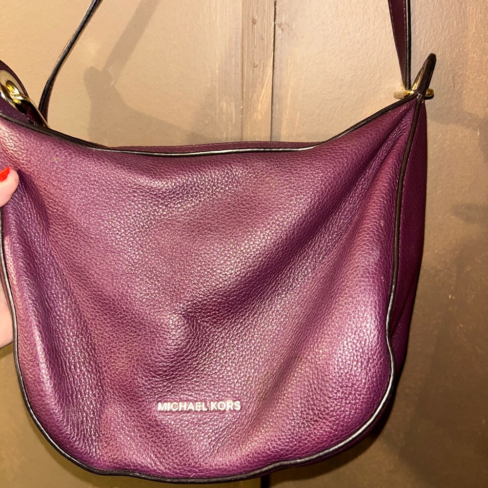 MK crossbody,purple 
Inside very clean